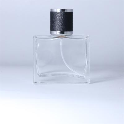 China New Design Wholesale 2021 Personal Care Luxury Transparent Cylinder 100ml Spray Black Glass Perfume Bottle for sale