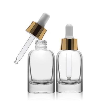 China Custom Empty Clear Frosted Amber Round Essential Oil Cosmetic Dropper Serum Glass Bottle for sale