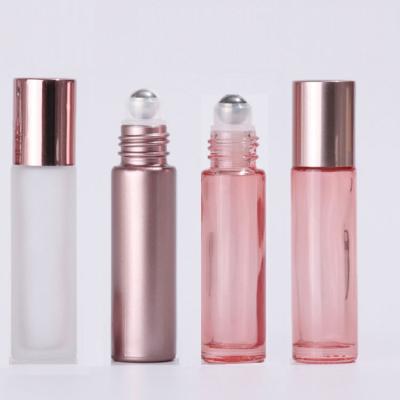 China Luxury 10ml cosmetic rose gold glass roll on bottle with steel/glass roller for sale