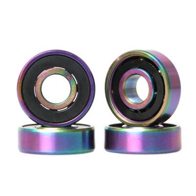 China Adult 608 2RS abec5 abec7 9 11 full titanium white ceramic skate ball skateboard bearings for sale