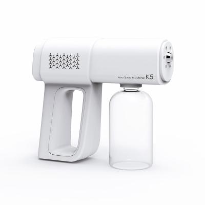 China 2021 New Vapor Gun K5 Blue Machine Handheld Ray Disinfectan Nano Spray Gun Garden Cordless Rechargeable Mist Sprayer for sale