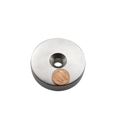 China Industrial Round Disc Countersunk Neodymium Magnet Screw Hole Rare Earth Magnet for sale