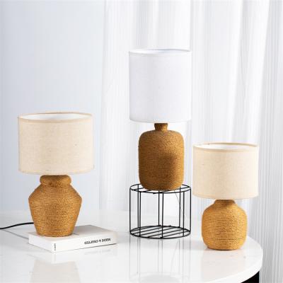 China New Design Hotel Home Decor Rope Base Hotel Bedside Bedside Ceramic Table Lamp For Bedroom for sale