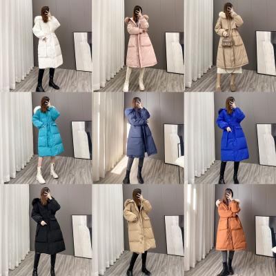 China 2021 Viable New Lightweight Long Down Jacket Women With Hooded Packable Down Coats Stand Collar Quilted Padded Stripper Jacket for sale