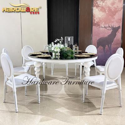 China Customized Dining Sets Round Mirrored Iron Dining Table Set White Legs Wedding Furniture Luxury for sale