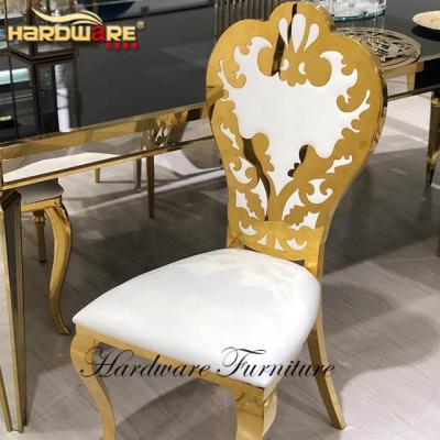 China Modern Wedding Event Banquet Throne Stainless Steel Gold Dining Chair With Cushions for sale