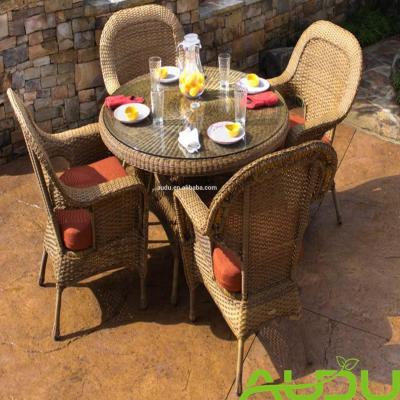 China Eco-freindly Audu Hot Sale PE Wicker Dining Chair Outdoor Garden Rattan Furniture Dining Table And Chair Sets for sale