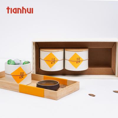 China Recycled Materials Bamboo Cardboard Gift Box Lid Tea Packaging Box With 3 Paper Canisters for sale