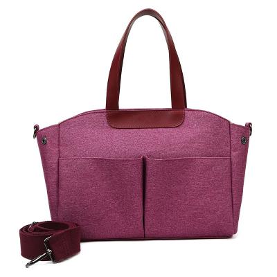 China Custom Water Resistant Glitter Mother Bag Baby Diaper Bags for sale