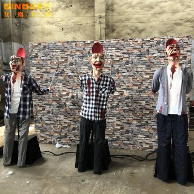 China Theme park horror animatronics hit zombie with brain for ghost house decoration haunted house design for sale