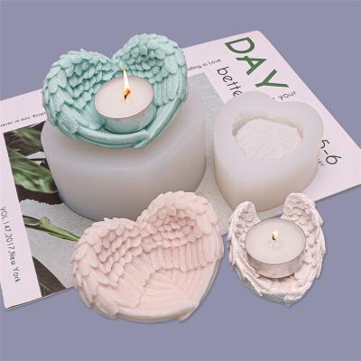 China Handmade Soap Clay Crafts Angel Wings Heart Shape Candle Holder Mold DIY Aromatherapy Plaster Fondant Cake Viable Mold for sale