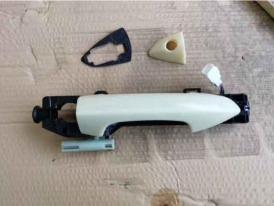 China Geely Binyue plastic black and white front door opening handle can open and close the door. for sale