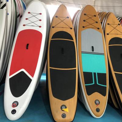 China Popular custom made good quality hot sale paddleboards unisex surfing paddle board inflatable cheap surfboards sip wooden grain for sale