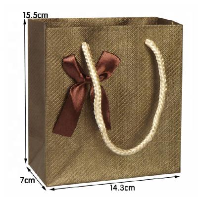 China Custom Print Disposable Bulk Brown Kraft Shipping Takeaway Gift Bag for sale