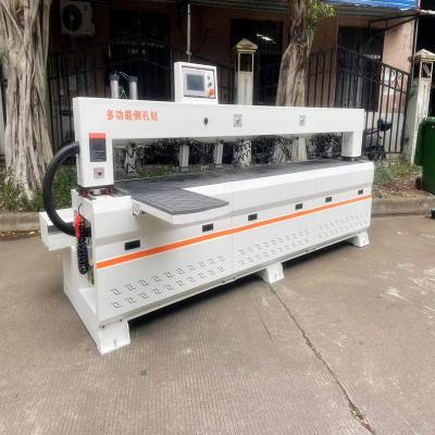 China CNC infrared side hole machine for woodworking machinery en venta