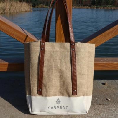 China Wholesale Women Handled Rivet Jute Shopping Bag With Custom Logo Tote Bags Manufacturer With Leather Handle for sale