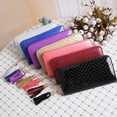 China Wholesale PU Purse Women Clutch Bag Zigzag Texture Fashion Multifunctional Women Wallet With Tassels for sale