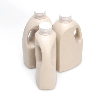 China Wheat 1L Cosmetic Straw Plastic Bottle In Stock Biodegradable Laundry Detergent Shampoo Bottles Press Pump Head Eco-friendly for sale