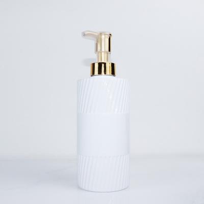 China Luxury Custom Pump Bottle 500ml Stripe White Caviar Luxury Custom Shampoo and Conditioner Bottle Luxury Wholesale Packaging for sale