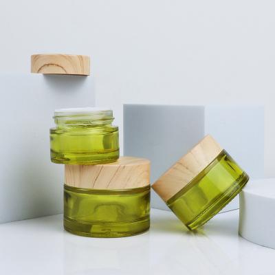 China 20g 30 50ml Cosmetic Luxury Round Empty Frosted Skin Care Bottle Sets Green Glass Jars With Bamboo Lids For Cosmetics for sale