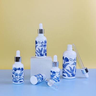 China Hot Sale Cosmetic Serum 10ml 20ml 30ml 50ml 100ml Porcelain Glass Blue White Bottle Eco-friendly Recyclable With Dropper for sale