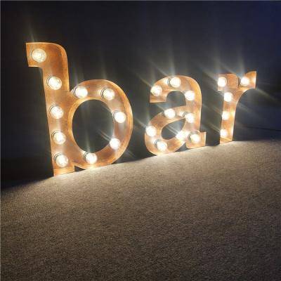 China Illuminated Buildings Rusty Metal Led Bulb Letters Marquee Sign Custom Metal Letter Led Bulb Sign for sale