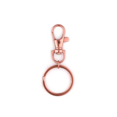 China Retail Industry Custom Metal Rose Gold Color Split Key Rings Key Chains Mute Key Chain for sale