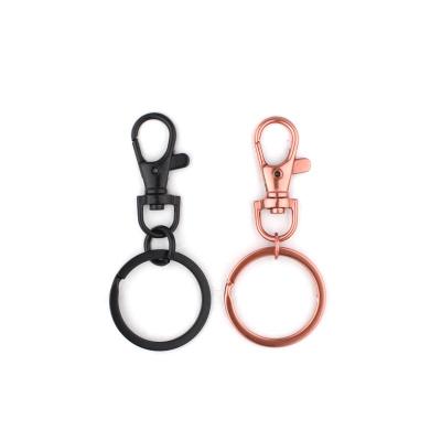 China Key Chain Black Mounted Gold Color Metal Key Chain With Snap Hook Zinc Alloy Key Chain for sale