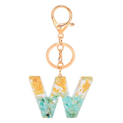 China Hot Selling Amazon Resin Alphabet Letter Glossy Transparent Gold Green Acrylic Resin Key Chain for sale