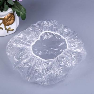 Chine Coupe de douche jetable élastique épaissississante de 21 pouces Cap de bain transparent Salon Hôtel Voyage Caps de douche en plastique PE à vendre