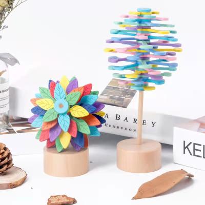 China Hot Selling Creative Musical Rotary Stress Reliever Decompression Lollipop Kids Children Puzzle Wooden Toys for sale