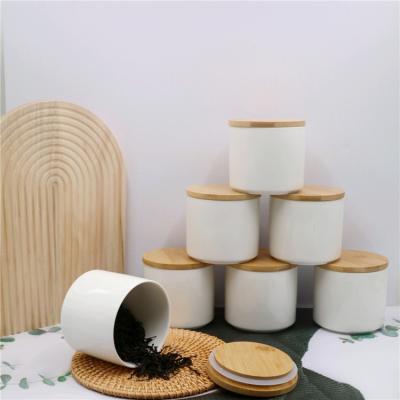 China Freshness Preservation 520ml High Quality Ceramic Kitchen Storage Jars & Canisters With Bamboo Lids for sale