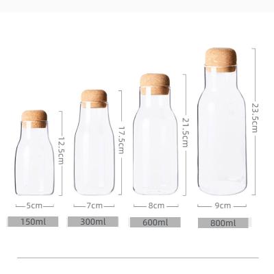 China Practical Freshness Preservation Glass Storage Tank Borosilicate Storage Jars For Restaurant Drinks Juice Heat Resistant Wine Bottle With Cork Cover for sale