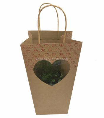 China Can Be Waterproof Valentine's Flower Kraft Paper Bag For Plant Potted Bag for sale