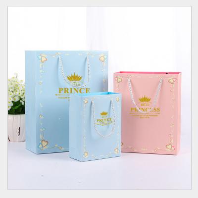 China Recyclable Customizable Large Size Pink Blue Gold Stamping Cardboard Paper Gift Handle Bag for sale