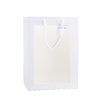 China Wholesale Recyclable Lovely Sweet Transparent Plastic Window Wedding Gift White Cardboard Paper Bags With Handle for sale