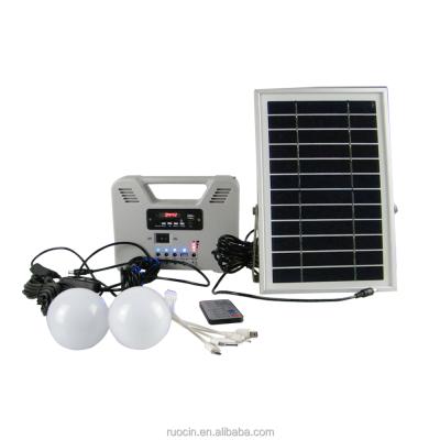 China Mini Multi Function Solar Home Emergency Lighting Kit with Phone Charger FM Radio MP3 for sale