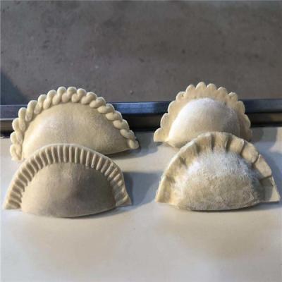 China empanadas making machine , automatic dumpling machine, jiaozi making machine for sale