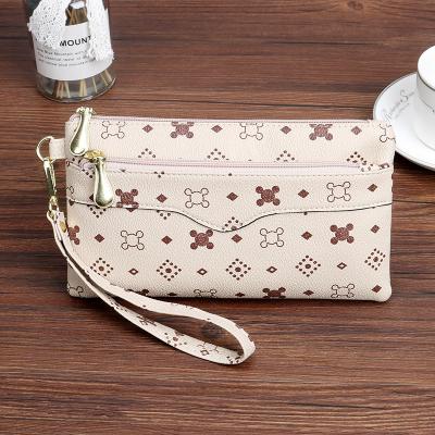 China No Lychee Fashion New Pattern Women's Multifunction Clutch Wallet Long With Shoulder Strap, In Running Lady Cell Phone Bag for sale