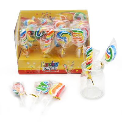 China Natural Handmade Colorful Rainbow Swirl Twist Shape Soft Hard Candy Lucky Christmas Lollipops for sale