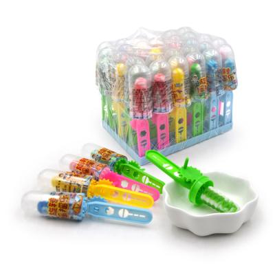 China Small Cartoon Hand Wheel Toy Candy With Sweet Fruit Natural Shake Flavor Around Swirl Twist Lollipop Candy for sale