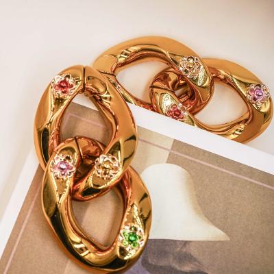 China Wholesale Decoration Accessories Shoe Buckle Shoe Link Chain Gold Plastic Buckle With Rhinestone. for sale