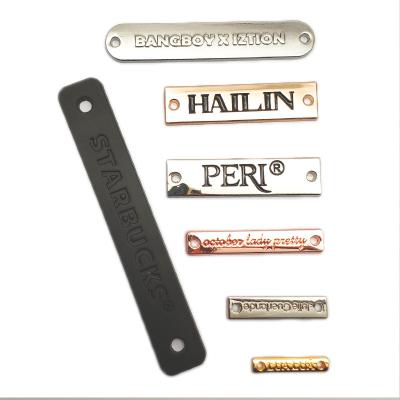 China Silver Paint Metal Clothing Label Viable Zinc Alloy Letter Nameplate Hand-sewn Underwear Hardware Electroplating Label for sale