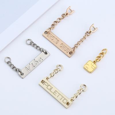 China Metal Small Letter Label Hand-stitched Logo Nameplate Decoration Textile Clothing Collar Viable Zinc Alloy Collar Chain Label Coat for sale