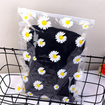 China Recyclable Transparent EVA Daisy Plastic Packaging Zipper Self Seal Bag For Clothing for sale