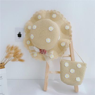 China Daily Life Summer Girls Beach Small Straw Hat Bag Set Child Daisy Sun Hat Bag For Kids Straw Hat Bag Set for sale