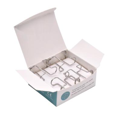 China SJ Best Quality Disposable Stainless Steel Dental Cotton Roll Holder Clip 4pcs/box OEM Wholesale Te koop