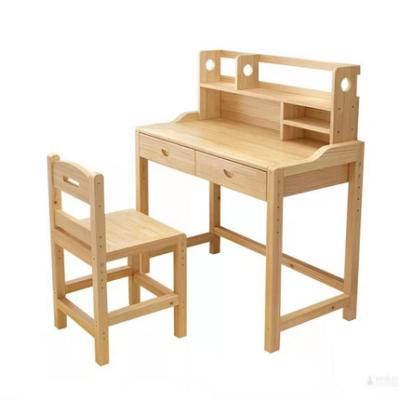 China The rotatable solid wood children's study desk can be lifted. Elementary School Office Desk and Chair Set Pine for sale