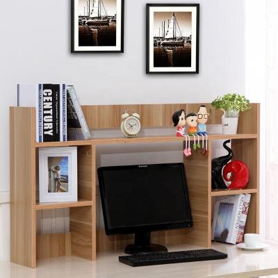 China Small bookshelf with partition on the table is a three-layer bookshelf with wooden desk for sale