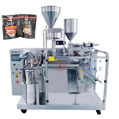 China Automatic Stand Bag Premade Food Doypack Oil Paste Sauce Liquid Filling Machines Spout Pouch Filling and Capping Machine for sale